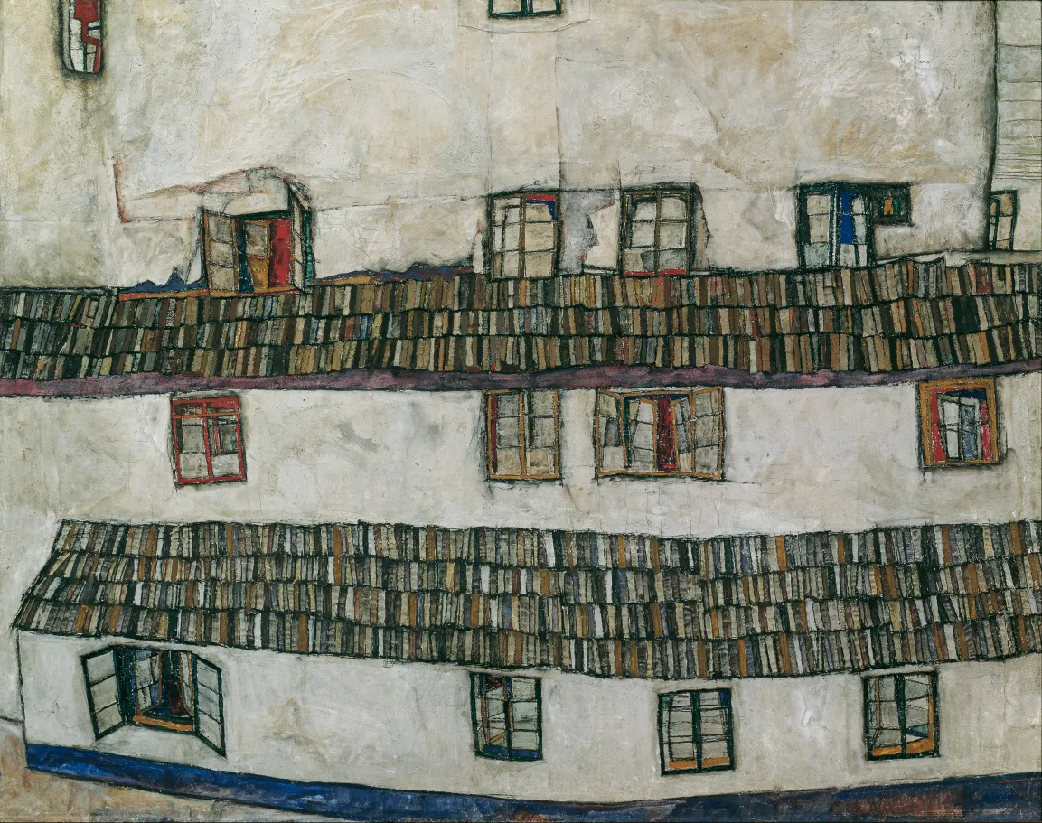 A house wall viewed close-up, with various different windows.