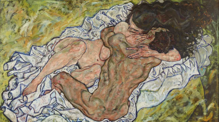 A naked woman and man embracing.